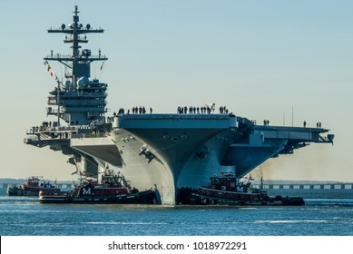 Newport News, Virginia / USA - :USS George H.W. Bush Leaving Northrop Grumman Shipbuilding In Newport News, Virginia For Naval Station Norfolk, Norfolk, Virginia 