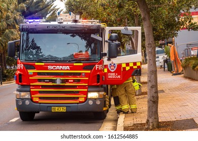 Newport NSW, Australia - Jan 9, 2020.
Australian Firetruck And Fire Fighters Having A Pitstop In Newport North Of Sydney. All Firefighters And Equipment Is In High Alert Due To Large Bushfires Around.