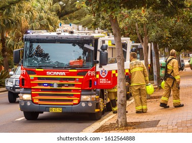 Newport NSW, Australia - Jan 9, 2020.
Australian Firetruck And Fire Fighters Having A Pitstop In Newport North Of Sydney. All Firefighters And Equipment Is In High Alert Due To Large Bushfires Around.