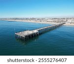 The Newport Pier and Beach with the Pacific Ocean from a UAV Aerial Drone