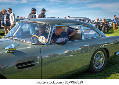 NEWPORT, RI: Jay Leno In An Aston Martin At An Audrain Concours Event