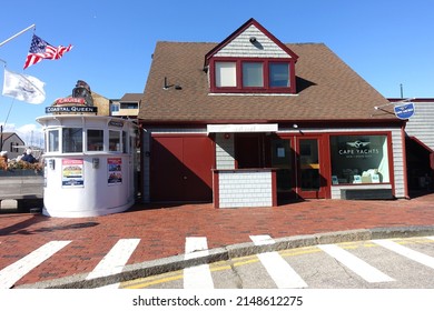 NEWPORT, RI - March 2022: Offices and Cruise Line Ticket Booth in Bowen's Wharf Area of Newport, Rhode Island