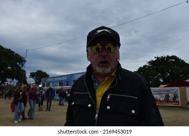 Newport, UK-June 19 2022: Isle Of Wight Music Festival Faces, Happy Festive People At The Mainstage And Festival Grounds On Sunday