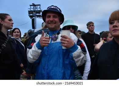 Newport, UK-June 19 2022: Isle Of Wight Music Festival Faces, Happy Festive People At The Mainstage And Festival Grounds On Sunday