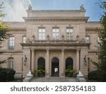 Newport, USA - September, 17th, 2015: Two sphynx at the beautiful entrance of theElms gilded age historic mansion at Bellevue avenue in Newport, Rhode Island, USA