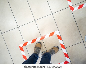 Newport, Wales/UK - 03/22/2020: Tape On The Floor Of A McDonald's Restaurant, So That Customers Practice Social Distancing, During The Coronavirus (covid-19) Crisis.