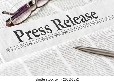 A newspaper with the headline Press Release - Shutterstock ID 260155352