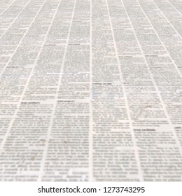 Newspaper with old unreadable text. Vintage blurred paper news texture square background. Textured page. Gray beige collage. Front top view.
