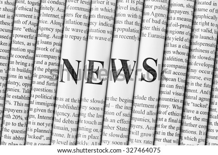 Newspapers with text information are folded and stacked together, big letters of headlines among the text are composing together the word NEWS. Concept of news media, print media and mass media at all