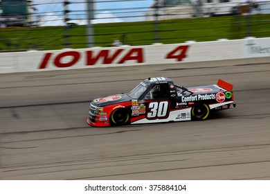 Newton Iowa, USA - July 11, 2014: NASCAR Camping World Truck Series, American Ethanol 200. Iowa Speedway. 30 Ron Hornaday Jr., Chevrolet, Turner Scott Motorsports