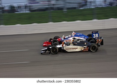 Newton Iowa, USA - June 25, 2011: Indycar Iowa Corn 250, Alex Tagliani / Graham Rahal Side By Side Racing Through A Corner..