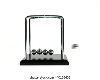 Newtons Cradle Isolated Against A White Background