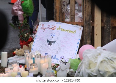 NEWTOWN, CT., USA, DEC 16, 2012: Sandy Hook Elementary School Shooting, Memorial Sign With Assorted Gifts, Dec 16, 2012 In Newtown, CT., USA