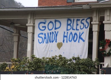 NEWTOWN, CT., USA, DEC 16, 2012: Sandy Hook Elementary School Shooting, God Bless Sandy Hook Hanging Sign, Dec 16, 2012 In Newtown, CT., USA