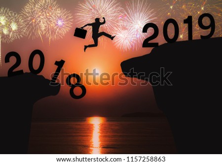 Newyear 2019 concept Businessman jumping to 2019 new year