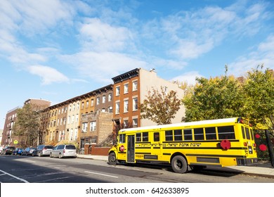NEW-YORK - NOV 14: School bus belonging to the Ahavat Israel Yeshiva for girls parked in Brooklyn, New-York, USA on November 14, 2012.