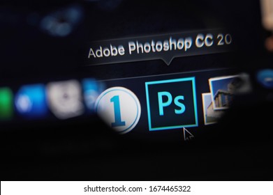 New-York , USA - March 13, 2020: Starting adobe photoshop program on laptop close up view