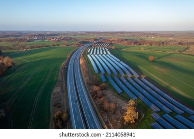 next to a freeway A20 in Germany is a photovoltaic open space plant