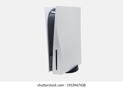 Next Gen Video Game Console With White Colored Plates And Black Body. It Has A Stand So The Console Sits Vertically Or Horizontally. 5th Generation Station To Play Modern Games.