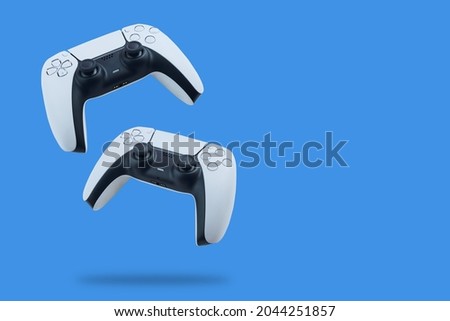 Next Generation Controllers falling on blue background.