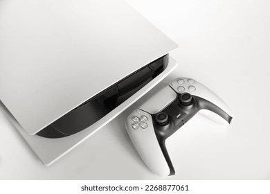 Next Generation game console and controller in close view