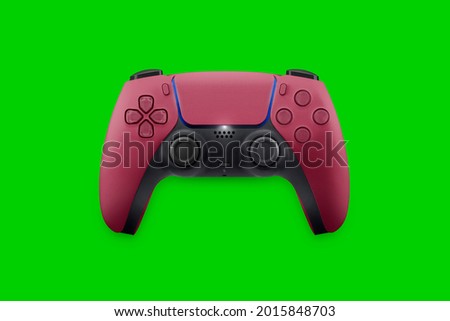 Next Generation red game controller isolated on green background. Top view. Chroma Key.