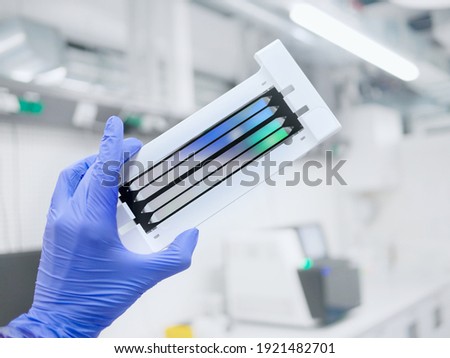 next generation sequencing flow cell. genetic engineering, genetic modification, designer baby and cloning concept. cancer screening and medical technology and therapy