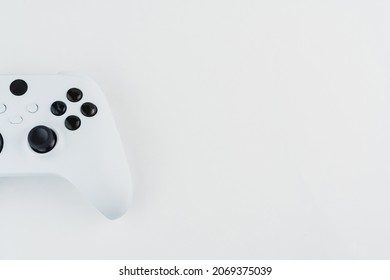 Next generation white game controller isolated on white background.