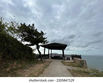 Next To The Pavilion On The Highest Point Of Dongzhou Island In Matsu, Taiwan Is A Garbage Collection Box With The Words 