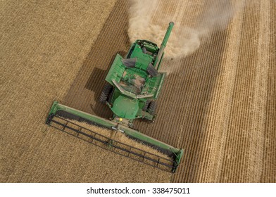 NEZPERCE, IDAHO/USA AUGUST, 9, 2015: John Deere S690 combine harvesting a field of wheat in Idaho.