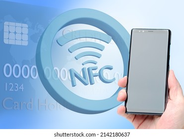 NFC Payments. Customer Is Paying With Smartphone Using NFC Technology. Big NFC Logo. Near Field Communicaton Technology. Contactless Payment Via Smartphone. Payment Technologies.