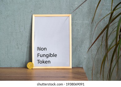 NFT Non - Fungible Tokens Inscription In The Art Frame. A Non-fungible Token (NFT) Is A Special Type Of Cryptographic Token Which Represents Something Unique.