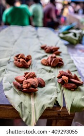 Ngali Nuts Laid Out In A Pacific Island Fruit And Vegetable Food Market. Shot In Honiara, Solomon Islands