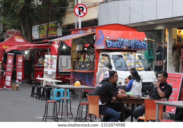 Nganjuk, INDONESIA - 29 February 2019: In the\
Car Free Night event, there are several modern food trucks that are\
of interest to residents of\
Nganjuk.