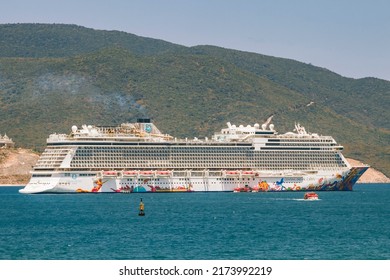 Nha Trang, Vietnam - April 16, 2019: Cruise Ship In The South China Sea. On The Background Of The Mountain.