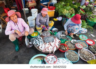 NHA TRANG, VIETNAM - JANUARY 20: Women are selling seafood at the wet market on January 20, 2016 in Nha Trang, Vietnam.