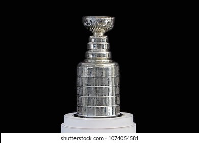 NHL ceremony - Stanley Cup trophy on the white stand, black background, Vancouver BC - October 22, 2018