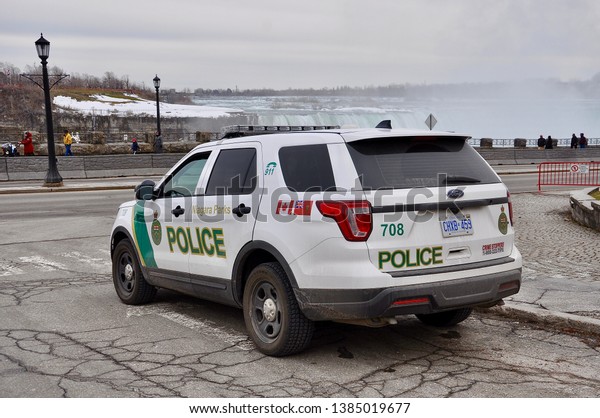 Niagara Falls, Canada - April 3,\
2019: Niagara Parks police car patrolling the Niagara Falls\
area.