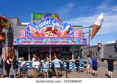 Niagara Falls, Canada - August 13, 2022: Funnel Cake Stand Serving The Many Tourists Drawn To The Area Near Clifton Hill That Has Several Tourist Attractions.