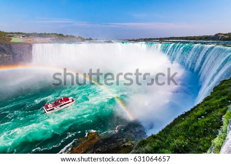 Niagara Falls Hornblower Tour Boat under Horseshoe Waterfall Rainbow