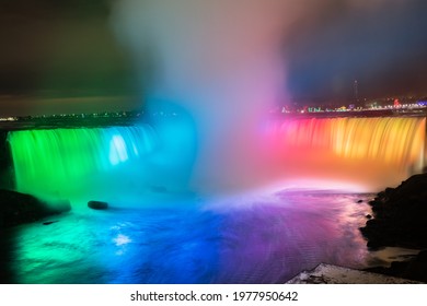 Niagara Falls illuminated in rainbow colors