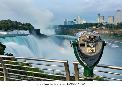 Niagara Falls in long exposure with a coin operated binocular telescope for viewing
