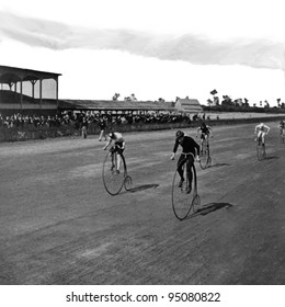 Niagara Falls, NY, USA C 1890: Boneshaker Bicycle Racers At The Finish Line. Vintage Photo. Bicycle Race, Attributed To: Geo. Barker (17 July 1844 – 1894) Vintage Stadium With Crowd Black And White