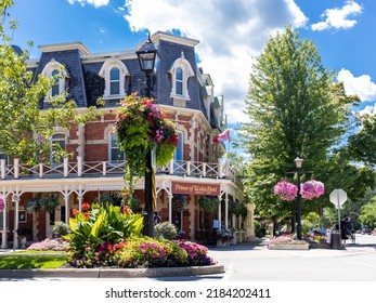 Niagara On The Lake, Canada, July 29 2022; The historic Prince of Wales hotel in Niagara On The Lake surrounded by flowers in summer