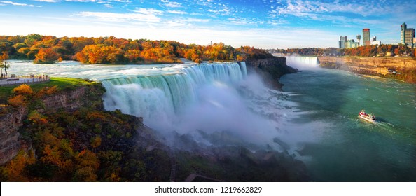 Niagara waterfall the big water fall between USA and Canada with Autumn and boat this immage can use for travel, waterfall, nature and united states of America concept