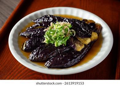 Nibitashi. deep-fried eggplant in broth