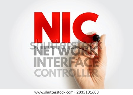 NIC Network Interface Controller text on white background with hand holding marker. Conceptual image for computer hardware, data communication, and digital networking technology