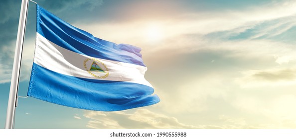 Nicaragua national flag waving in beautiful sunlight.