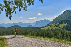 Nice, Active Senior Woman Underway With Her Electric Mountain Bike In The Bregenz Wald Near Dornbirn, VorarlbergAlps, Austria