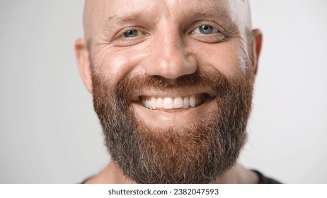 Nice bald 30s man look camera close up. Happy cute ginger 40s guy face portrait. Male red bushy beard head shot. No hair life. Joyful model have fun. Brutal young adult bald person smile. Barber shop. - Powered by Shutterstock